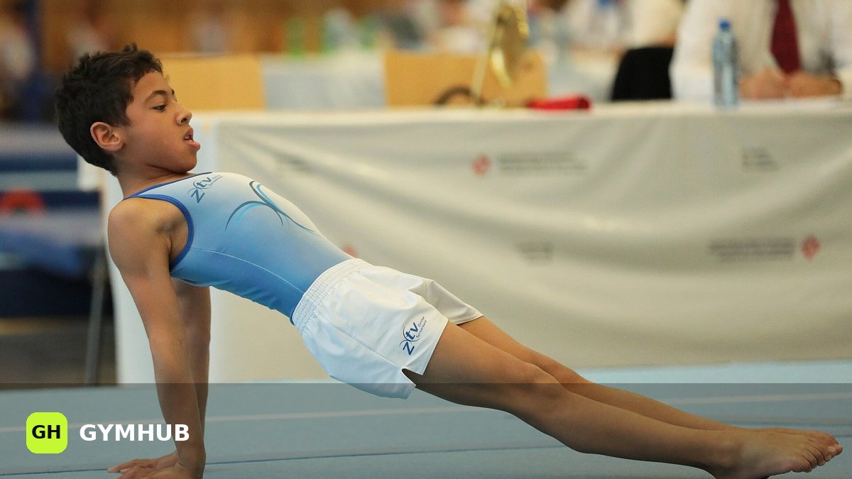 Upper Back Pain in Lifters: Causes, What to Change, and When to See a Doctor
